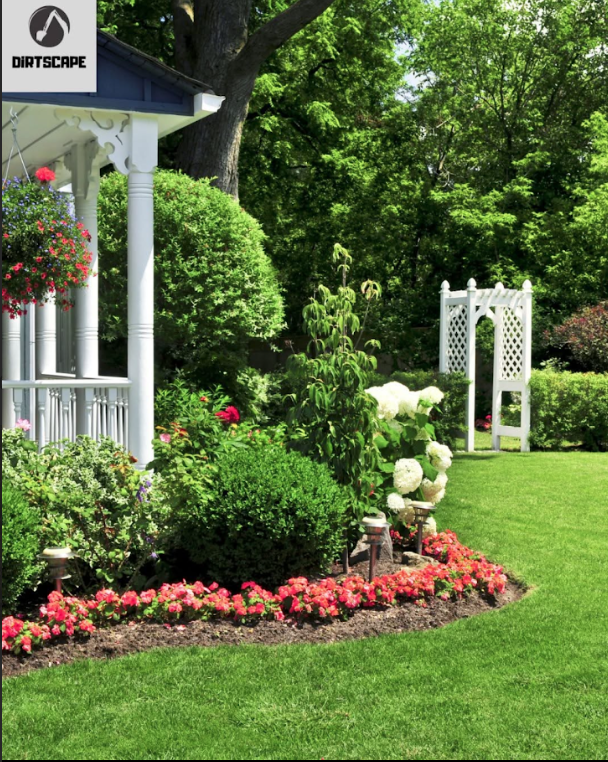 Front yard garden transformation with decorative arbor and plantings in Jonesboro, GA