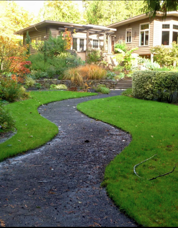 Curved stone walkway hardscaping installation with landscaping in Atlanta, GA