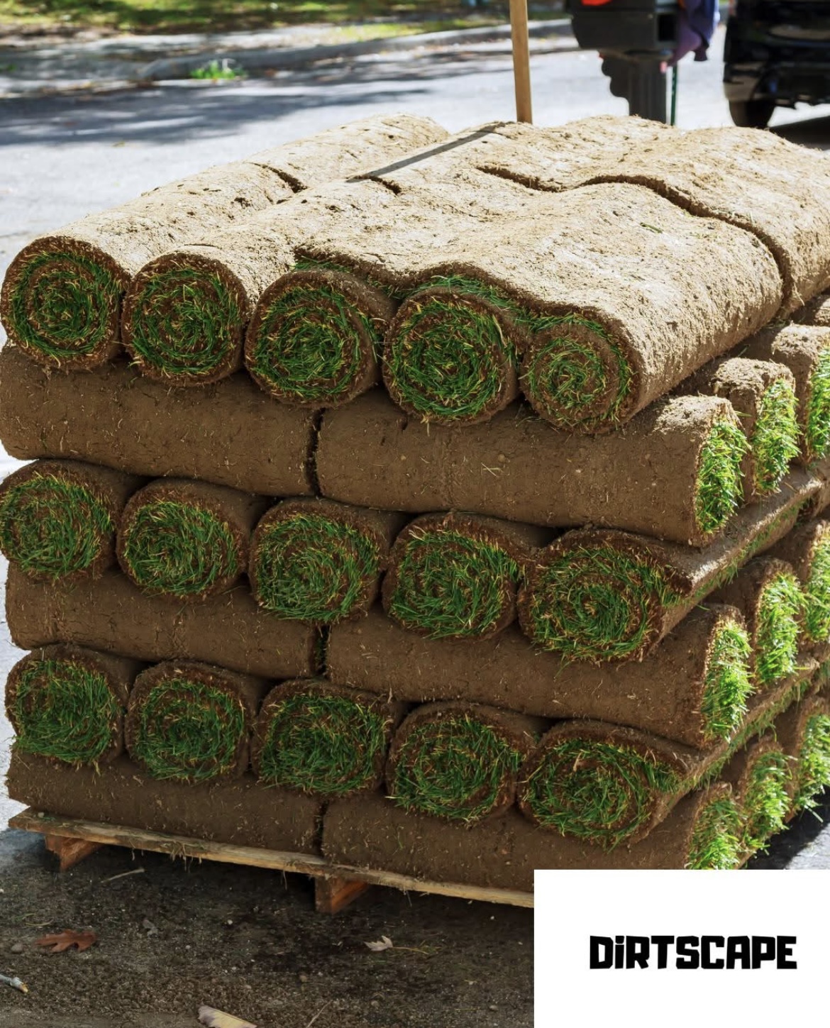 Pallet of rolled sod ready for installation