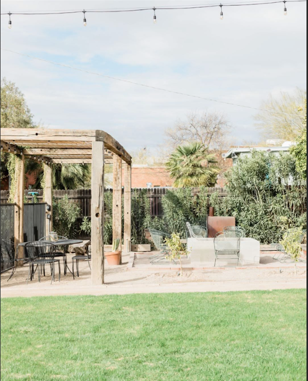 Luxury patio hardscaping with pergola and outdoor dining area in Stone Mountain, GA